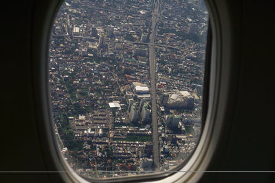 View of city seen through airplane window