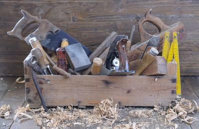 High angle view of tools on wood