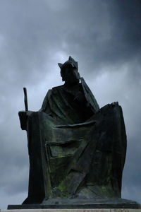 Low angle view of statue against sky