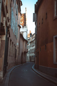 Road amidst buildings in town