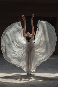 Rear view of ballet dancer dancing