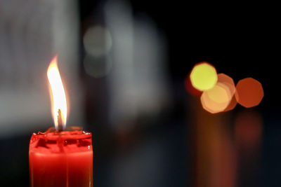 Close-up of burning candle