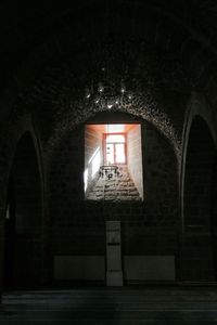 Low angle view of illuminated building at night