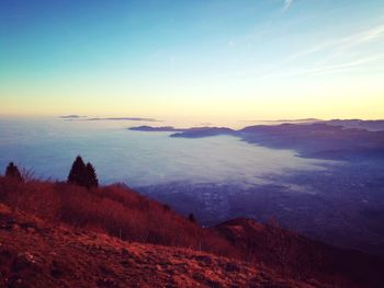 Scenic view of sea against sky during sunset