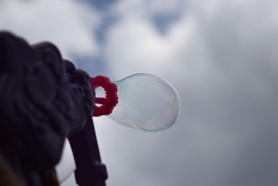 Reflection of man in bubbles