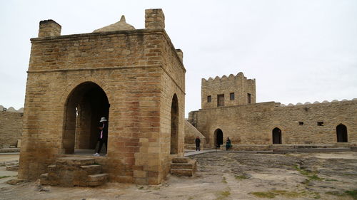 Low angle view of historic building against sky