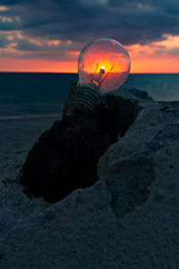 Scenic view of sea against sky at sunset