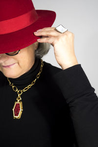 Close-up of woman wearing hat