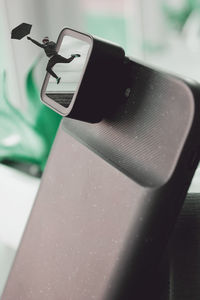 Close-up of mobile phone on table