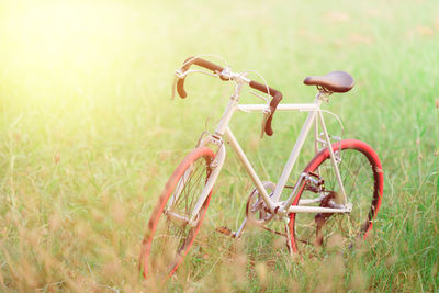 Close-up of bicycle on field