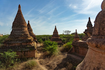 View of temple against building