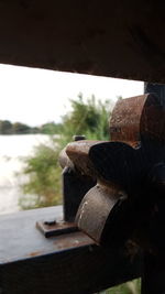 Close-up of log on table by river