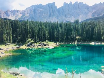 Scenic view of lake by mountains