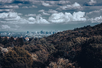 Aerial view of cityscape against sky