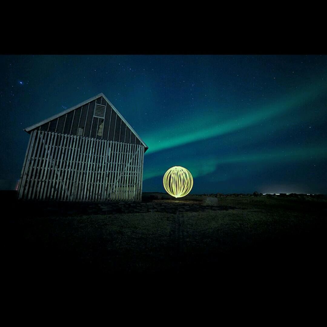 night, illuminated, sky, circle, moon, low angle view, built structure, blue, copy space, architecture, dark, transfer print, building exterior, outdoors, no people, astronomy, lighting equipment, auto post production filter, full moon, geometric shape