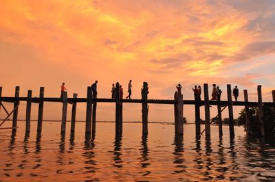 Scenic view of calm sea at sunset