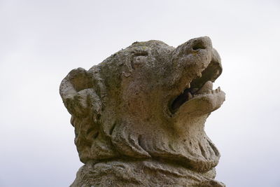 Low angle view of statue against clear sky