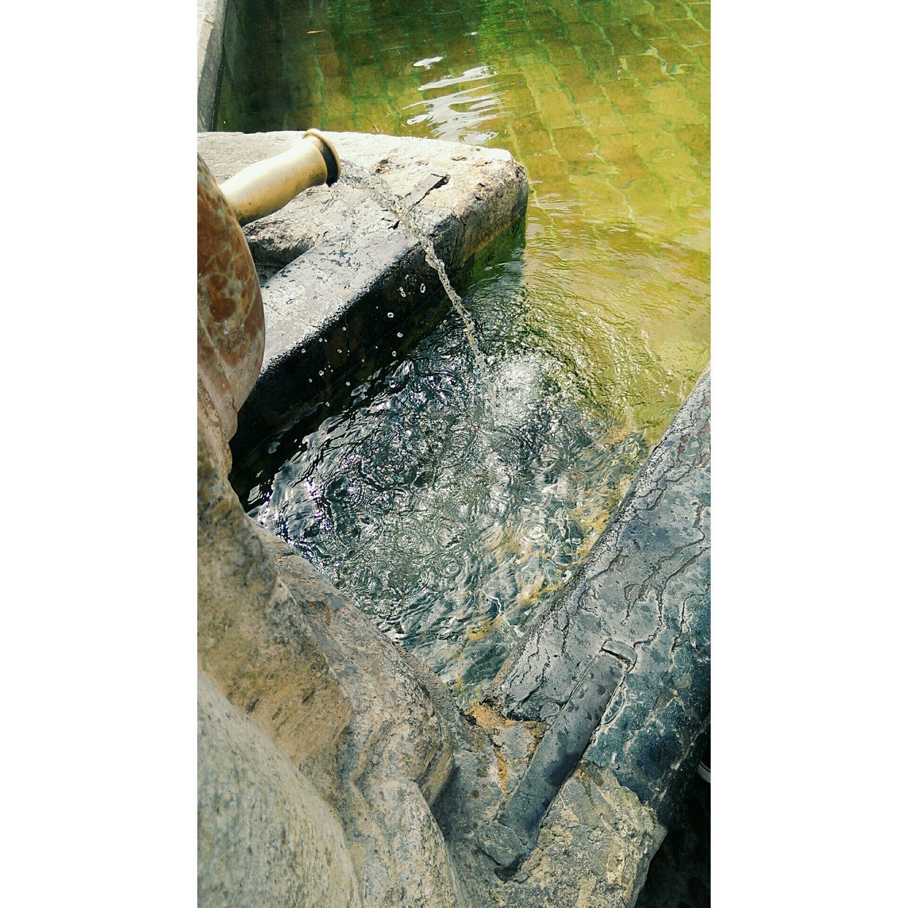 water, high angle view, transfer print, nature, auto post production filter, river, rock - object, day, outdoors, motion, lake, no people, sunlight, tranquility, reflection, rippled, wet, waterfront, elevated view, surf