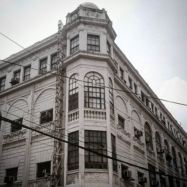 architecture, building exterior, built structure, low angle view, window, building, residential building, sky, residential structure, city, clear sky, balcony, day, outdoors, no people, cable, exterior, facade, power line, apartment