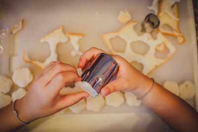 Close-up of person preparing food