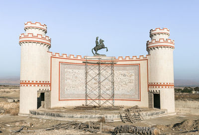 Low angle view of old building against clear sky