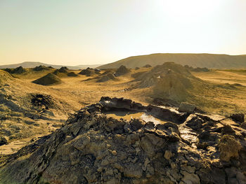 Scenic view of desert against clear sky