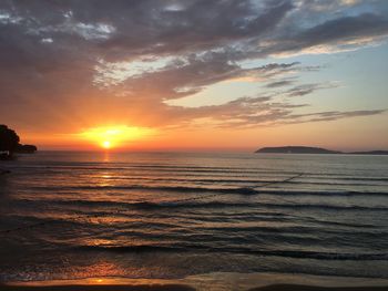 Scenic view of sea against sky during sunset