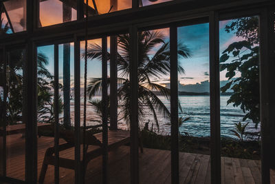 Scenic view of sea seen through window