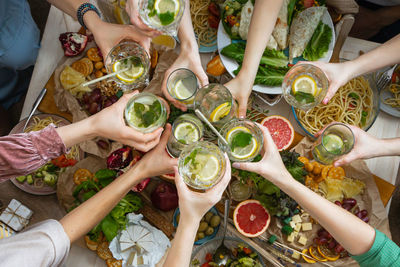 Group of people in drinking glass