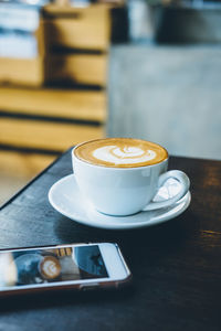 Close-up of coffee on table