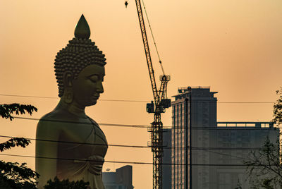 The giant golden buddha in wat paknam phasi charoen temple in phasi charoen district