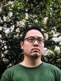 Portrait of young man wearing eyeglasses