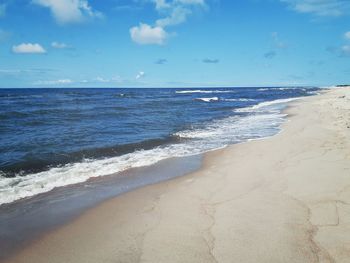 Scenic view of beach against sky