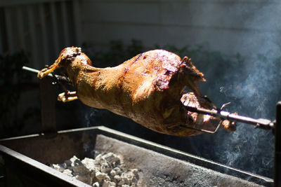 High angle view of meat on barbecue grill