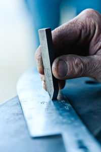 Senior smith decorating steel knife