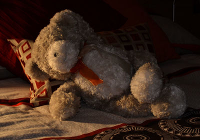Stuffed toy on bed