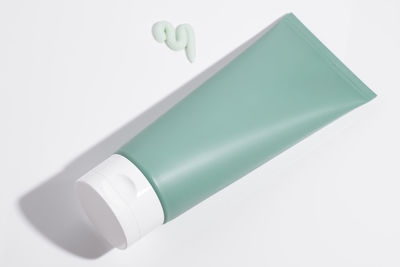 Close-up of pills against white background