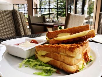 Close-up of breakfast in plate on table at restaurant