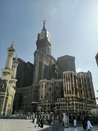 Low angle view of buildings in city against sky