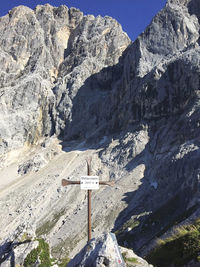 A mountain cross on the top of it