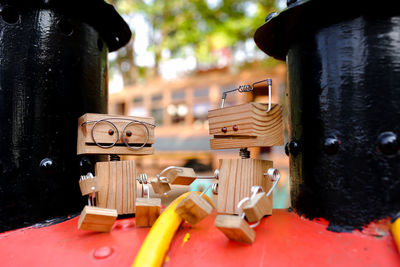 Close-up of toy hanging on table