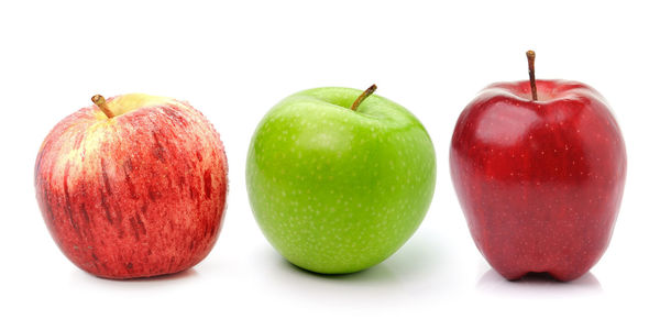 Close-up of apple against white background