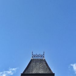 Low angle view of built structure against blue sky