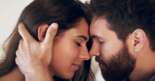 Smiling couple embracing each other