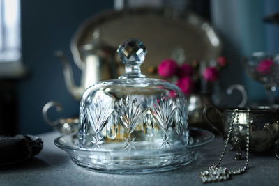 Close-up of vintage glass on table