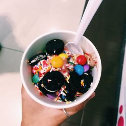 Midsection of person holding ice cream