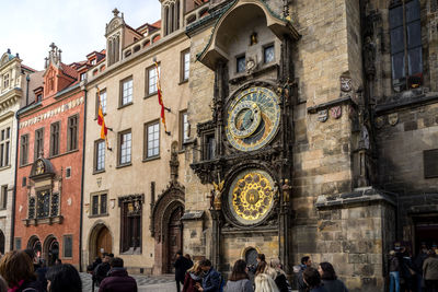 Group of people in front of historical building