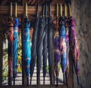 Close-up of clothes hanging at market stall