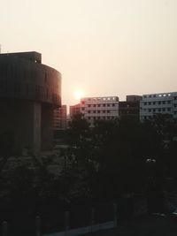View of buildings at sunset