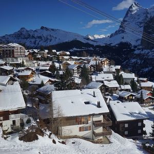 Snow covered mountain range in background